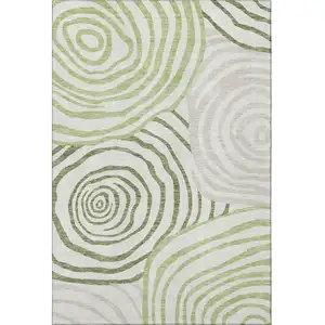 Photo of Green Gray And Ivory Abstract Washable Area Rug With UV Protection