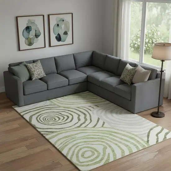 Green Gray And Ivory Abstract Washable Area Rug With UV Protection Photo 1