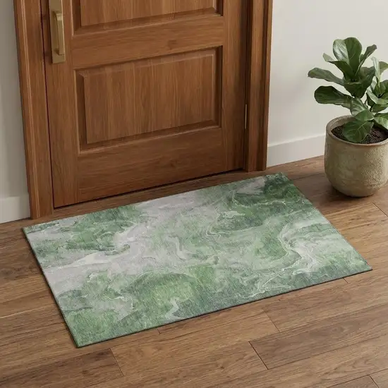 Green Gray And Ivory Abstract Washable Area Rug With UV Protection Photo 1