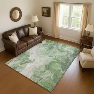 Photo of Green Gray And Ivory Abstract Washable Area Rug With UV Protection