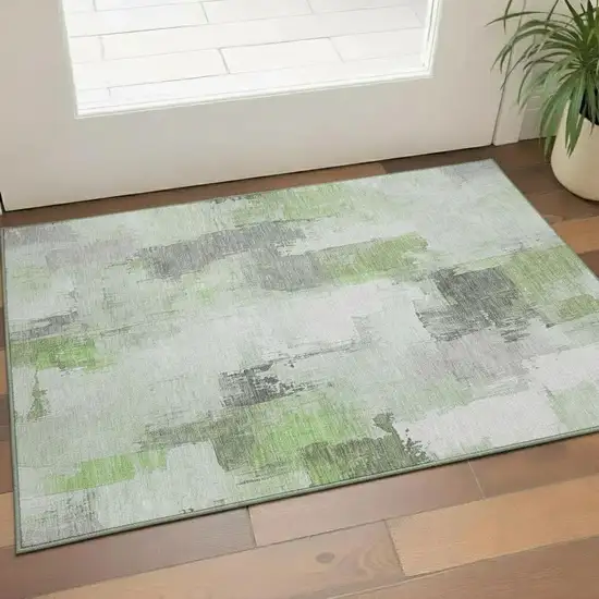 Green Gray And Ivory Abstract Washable Area Rug With UV Protection Photo 2