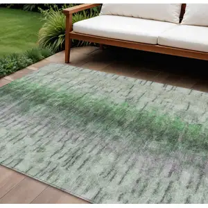 Photo of Green Gray And Ivory Abstract Washable Indoor Outdoor Area Rug