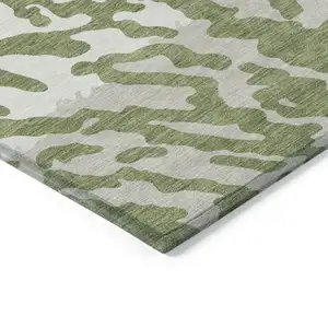 Photo of Green Gray And Ivory Animal Print Washable Indoor Outdoor Area Rug