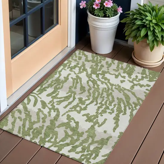 Green Gray And Ivory Animal Print Washable Indoor Outdoor Area Rug Photo 1