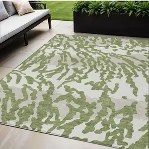 Photo of Green Gray And Ivory Animal Print Washable Indoor Outdoor Area Rug