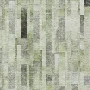 Photo of Green Gray And Ivory Striped Washable Area Rug With UV Protection