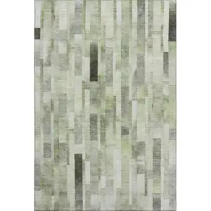 Photo of Green Gray And Ivory Striped Washable Area Rug With UV Protection