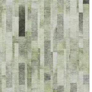 Photo of Green Gray And Ivory Striped Washable Area Rug With UV Protection
