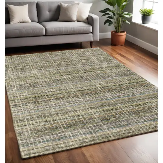 Gray and Ivory Abstract Power Loom Area Rug Photo 1