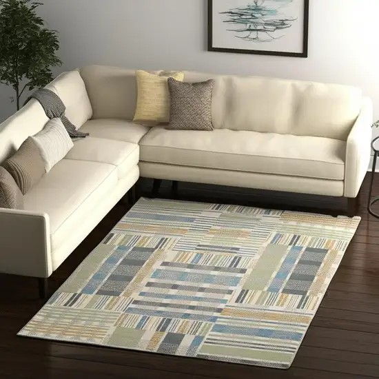 Gray and Ivory Geometric Power Loom Area Rug Photo 1