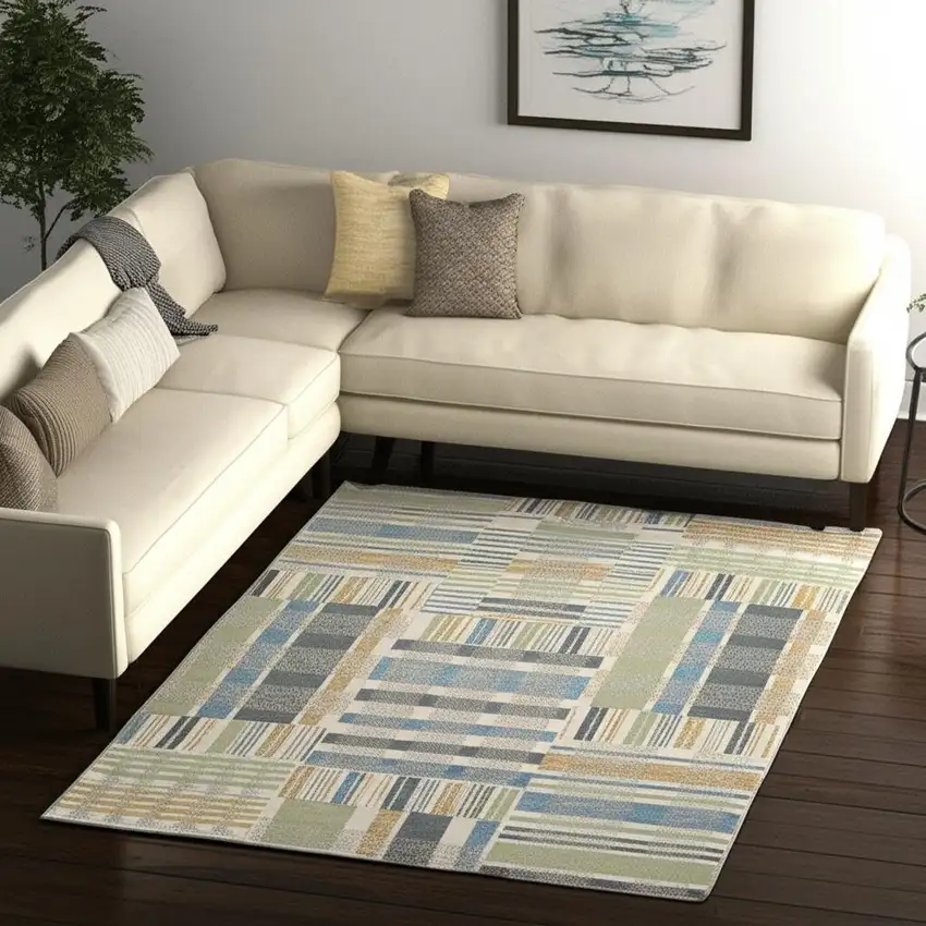 Gray and Ivory Geometric Power Loom Area Rug Photo 1