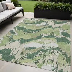 Photo of Green Ivory And Beige Abstract Washable Indoor Outdoor Area Rug