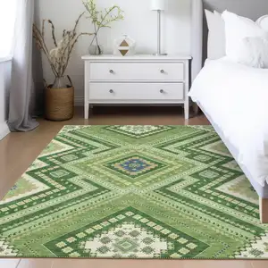 Photo of Green Ivory And Beige Tribal Washable Indoor Outdoor Area Rug
