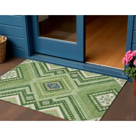Green Ivory And Beige Tribal Washable Indoor Outdoor Area Rug Photo 1