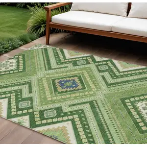 Photo of Green Ivory And Beige Tribal Washable Indoor Outdoor Area Rug