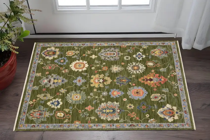 Green Ivory And Blue Oriental Area Rug With Fringe Photo 1