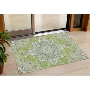 Photo of Green Ivory And Brown Oriental Washable Indoor Outdoor Area Rug