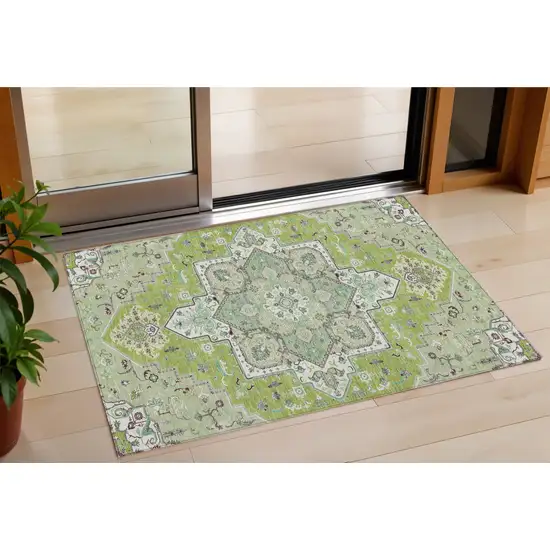 Green Ivory And Brown Oriental Washable Indoor Outdoor Area Rug Photo 1