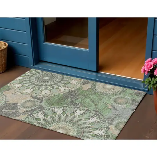 Green Ivory And Gold Paisley Washable Indoor Outdoor Area Rug Photo 1