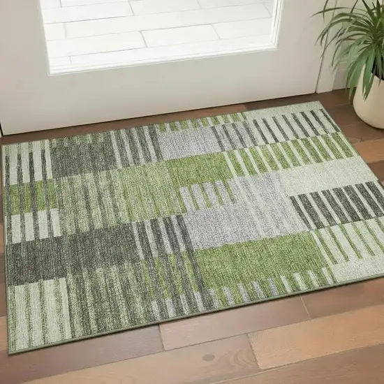 Green Ivory And Gray Striped Washable Area Rug With UV Protection Photo 1