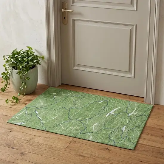 Green Ivory And Navy Blue Abstract Washable Area Rug With UV Protection Photo 1
