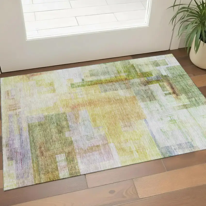 Green Ivory Gold And Purple Abstract Geometric Washable Area Rug With UV Protection Photo 1