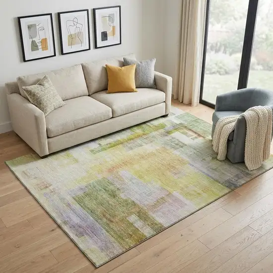Green Ivory Gold And Purple Abstract Geometric Washable Area Rug With UV Protection Photo 1