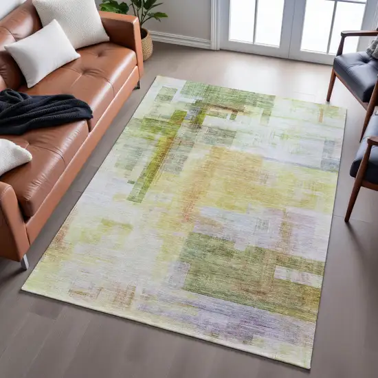 Green Ivory Gold And Purple Abstract Geometric Washable Area Rug With UV Protection Photo 1