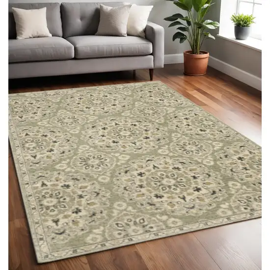 Green Ivory Grey And Tan Floral Power Loom Stain Resistant Area Rug Photo 1
