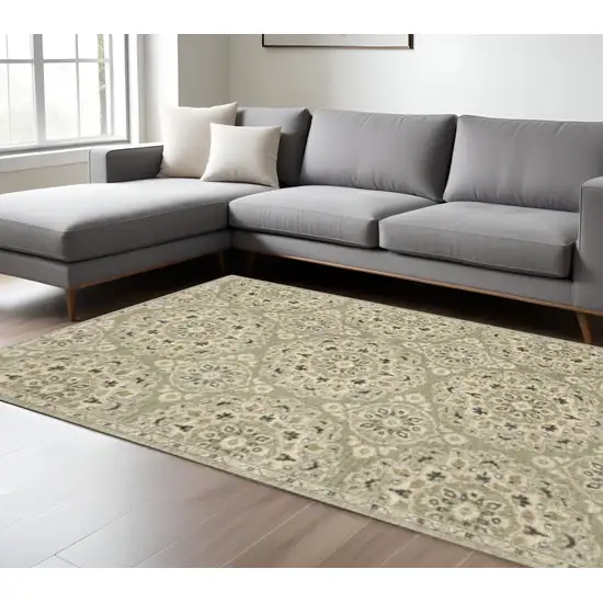 Green Ivory Grey And Tan Floral Power Loom Stain Resistant Area Rug Photo 1