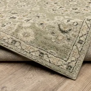 Photo of Green Ivory Grey And Tan Floral Power Loom Stain Resistant Runner Rug