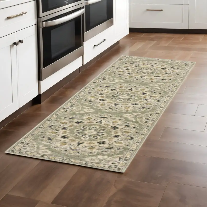 2' X 8' Green Ivory Grey And Tan Floral Power Loom Stain Resistant Runner Rug Photo 1