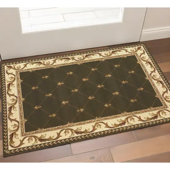 Dark Green And Ivory Floral Medallion Area Rug Photo 1