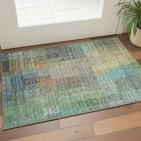 Green Orange And Blue Abstract Geometric Washable Area Rug With UV Protection Photo 2