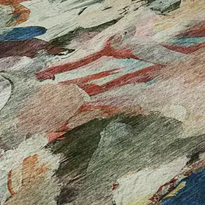 Photo of Green Orange And Teal Abstract Washable Area Rug With UV Protection