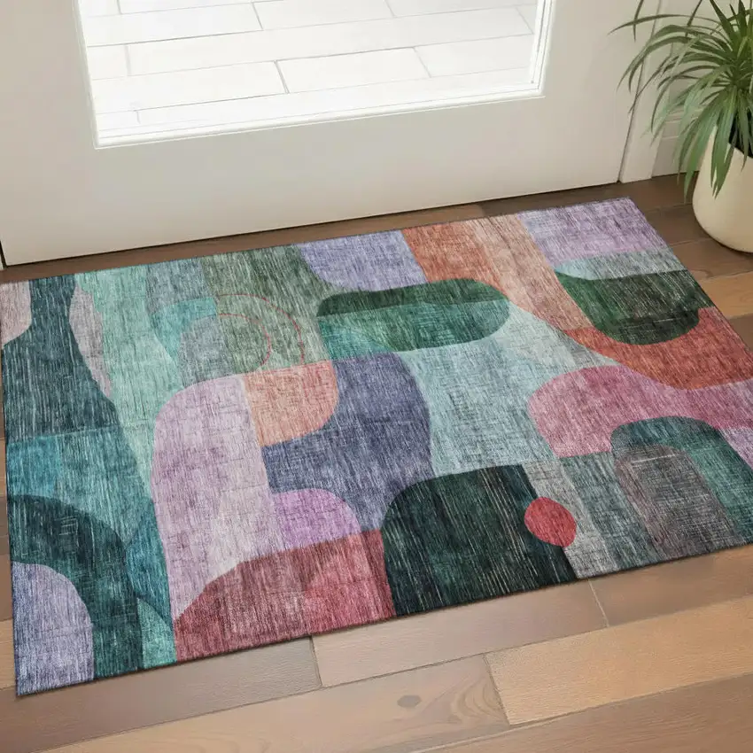 Green Orange Purple And Teal Abstract Geometric Washable Area Rug With UV Protection Photo 1