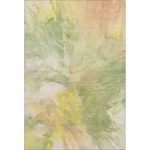 Photo of Green Peach And Yellow Abstract Washable Area Rug With UV Protection