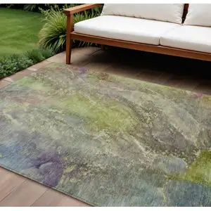 Photo of Green Pink And Gold Abstract Washable Indoor Outdoor Area Rug