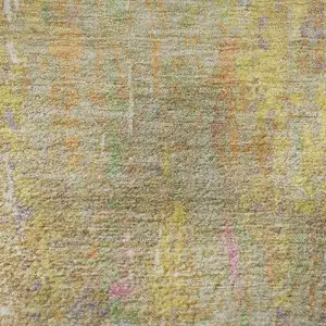 Photo of Green Purple And Gold Abstract Washable Area Rug With UV Protection