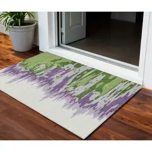 Photo of Green Purple And Ivory Abstract Washable Indoor Outdoor Area Rug