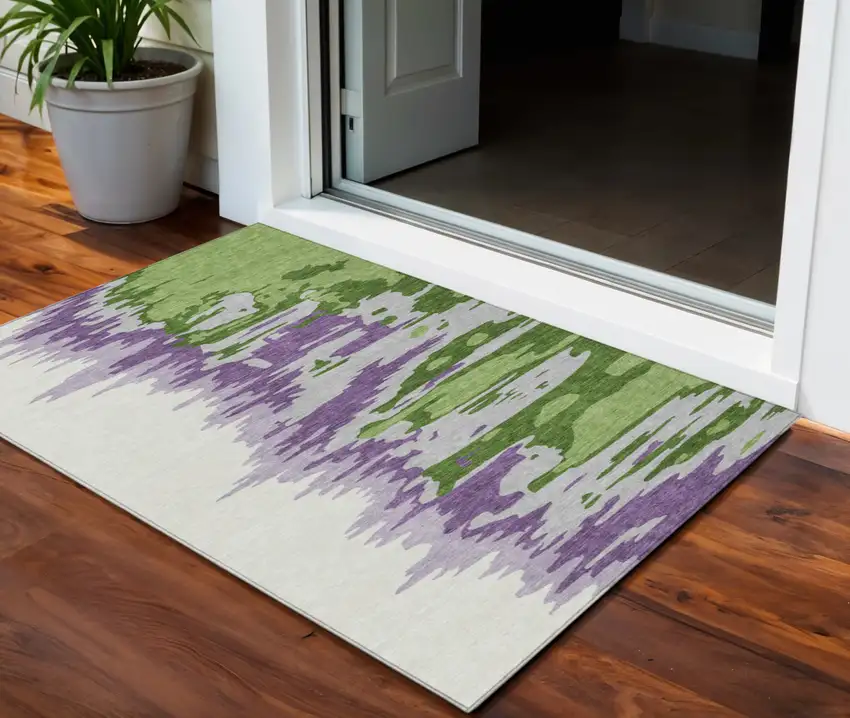 Green Purple And Ivory Abstract Washable Indoor Outdoor Area Rug Photo 1