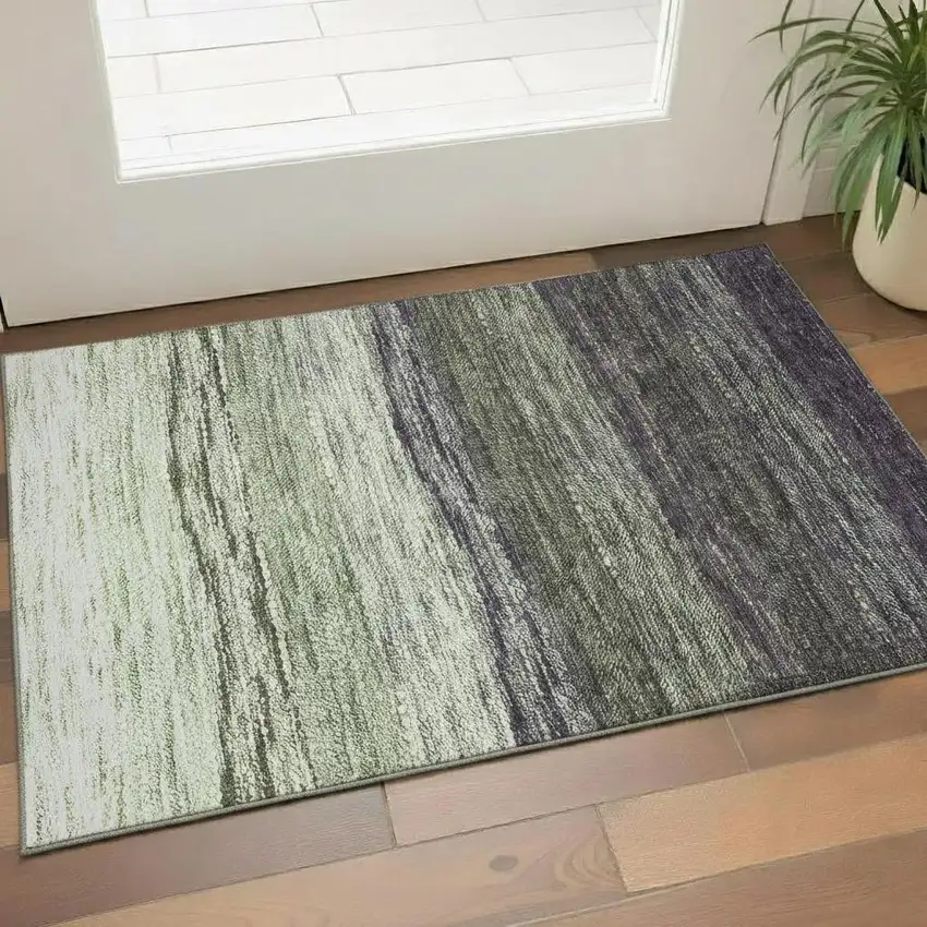 Green Purple And Ivory Ombre Washable Area Rug With UV Protection Photo 1
