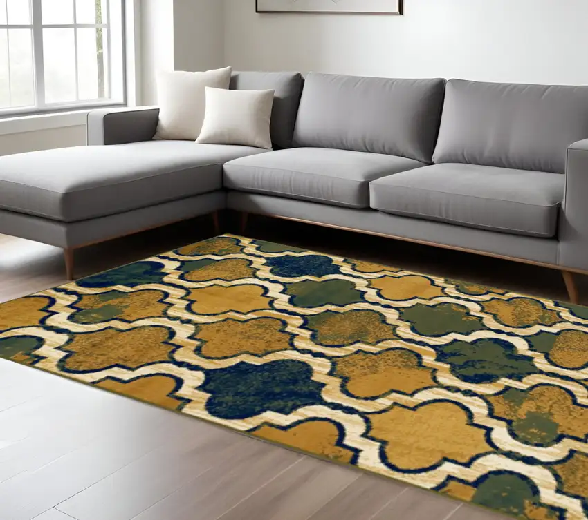 Green Brown And Ivory Quatrefoil Distressed Area Rug Photo 1