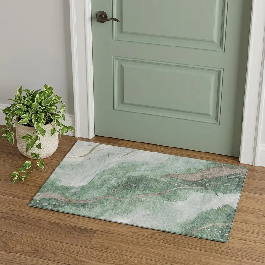 Green Taupe And Ivory Abstract Washable Area Rug With UV Protection Photo 1