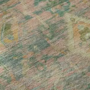 Photo of Green Teal And Orange Floral Washable Area Rug With UV Protection