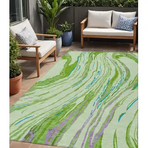 Photo of Green Teal Blue And Purple Abstract Washable Indoor Outdoor Area Rug
