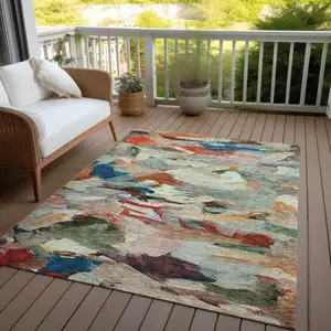 Photo of Green Teal Blue And Terra Cotta Abstract Washable Indoor Outdoor Area Rug