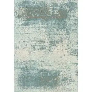 Photo of Green White And Gray Abstract Washable Area Rug With UV Protection