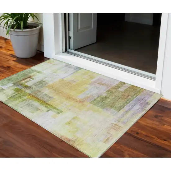 Green Yellow And Purple Abstract Washable Indoor Outdoor Area Rug Photo 1