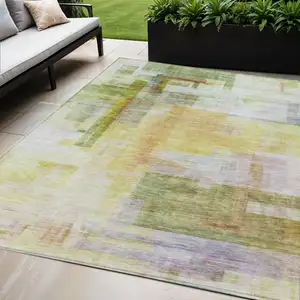 Photo of Green Yellow And Purple Abstract Washable Indoor Outdoor Area Rug